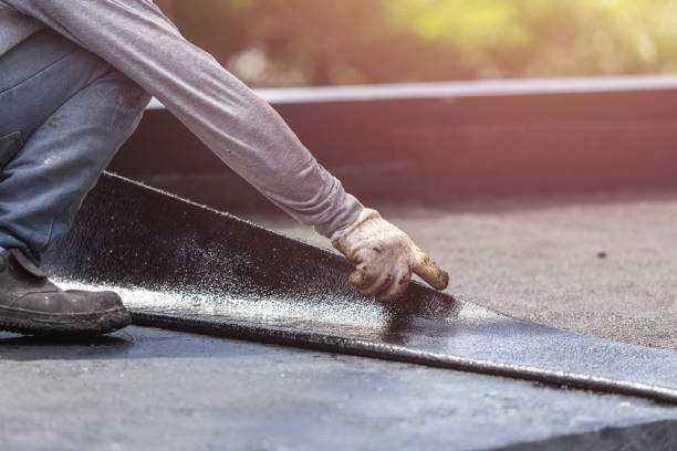 Professional Basement Waterproofing technician working in Holgate, OH